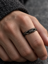 Load image into Gallery viewer, Side-angle view of The Unbroken ring worn on a hand.