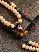 Load image into Gallery viewer, 108-Bead Tibetan-Inspired Mala Necklace with Decorative Centerpiece | Sculpted Centerpiece | NORBU OBJECTS