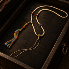 Load image into Gallery viewer, The Mark of Time pendant cord necklace with central bead — image 02