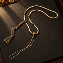 Load image into Gallery viewer, The Mark of Time pendant cord necklace with central bead — image 04