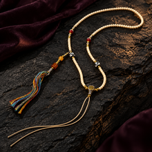Load image into Gallery viewer, The Mark of Time pendant cord necklace with central bead — image 03
