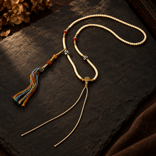 Load image into Gallery viewer, The Mark of Time pendant cord necklace with central bead — image 05
